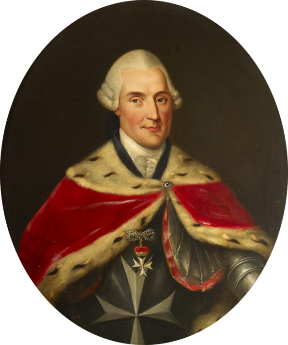 ALT="Man in red mantle with fur lining over armour with Order symbol, eight-pointed cross hangs over chest"