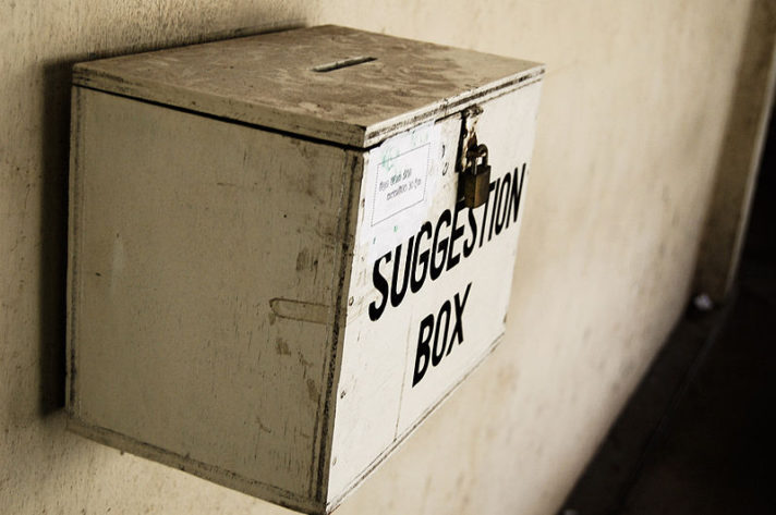 ALT="An image of a suggestion box. Author: Hash Milhan. Wikimedia Commons"