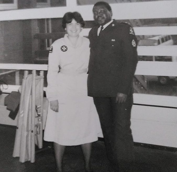 Project Volunteer Joyce Guillaume as an adult Nursing member of the Brixton Division in the late 1980s with Carl Smart, Divisional Superintendent.