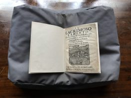 The title page of 'Il lacrimoso lamento' features the title of the work and a woodcut illustration depicting an Early Modern ship docked in the harbour of a city.