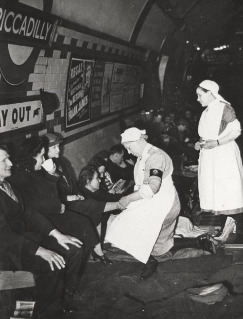 A St John Ambulance Brigade nurse treating civilian patients at Piccadilly Underground Station in London during the Second World War, 1939 - 1945 (Image ref: A1104)