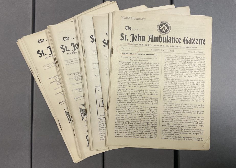 A photograph of some early issues of The St. John Ambulance Gazette, a publication from St John Ambulance in Australia.